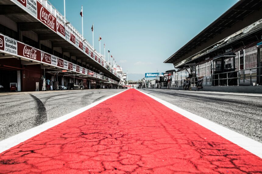 a race track with a red and white line painted on it