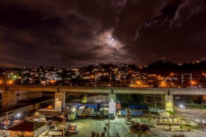 city with high rise buildings during night time