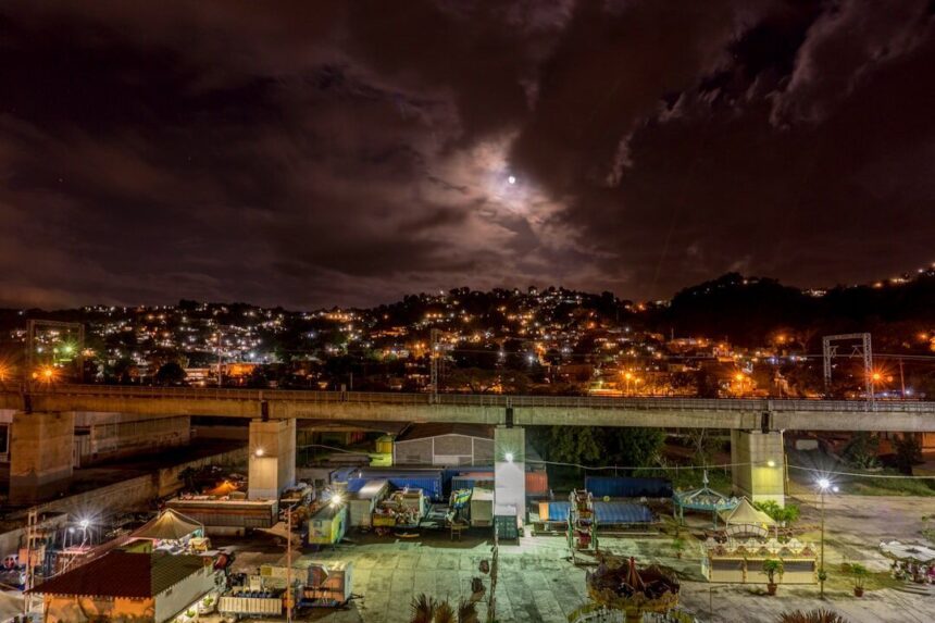 city with high rise buildings during night time